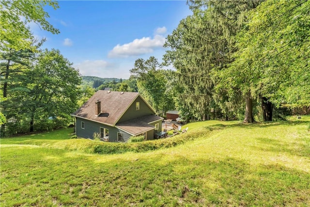 203 Stoney Hollow Rd, Winfield Twp, PA 16023 - rear view of property with a lawn
