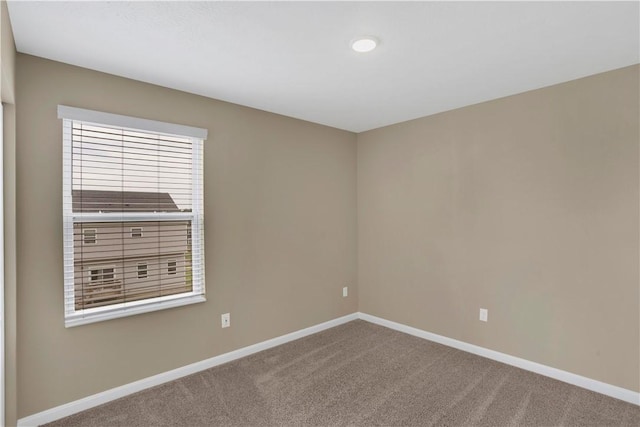 115 Cottonwood Dr, Brighton Twp, PA 15009 - carpeted empty room featuring baseboards