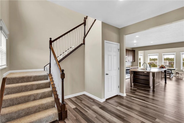 115 Cottonwood Dr, Brighton Twp, PA 15009 - stairs featuring wood finished floors, recessed lighting, and plenty of natural light