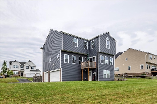 115 Cottonwood Dr, Brighton Twp, PA 15009 - back of property with a garage and a wooden deck