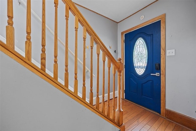 107 Ambridge Ave, Leet Twp, PA 15003 - entrance foyer featuring wood-type flooring, ornamental molding, and stairway