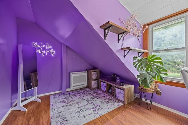107 Ambridge Ave, Leet Twp, PA 15003 - interior space featuring vaulted ceiling, heating unit, and wood finished floors