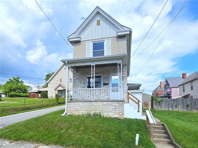 596 Beech St, City Of Washington, PA 15301 - view of front of house featuring stone siding, a porch, and board and batten siding
