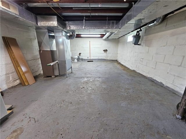 596 Beech St, City Of Washington, PA 15301 - unfinished below grade area with heating unit and concrete block wall