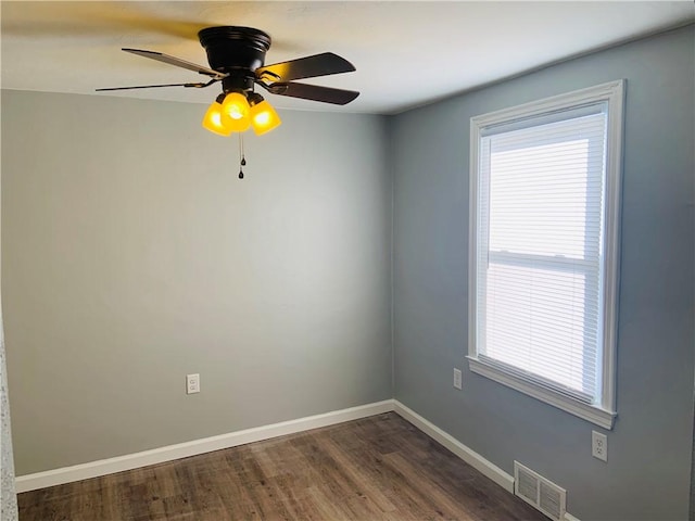 120 Graham Ave N, Versailles, PA 15137 - spare room featuring dark wood-type flooring and ceiling fan