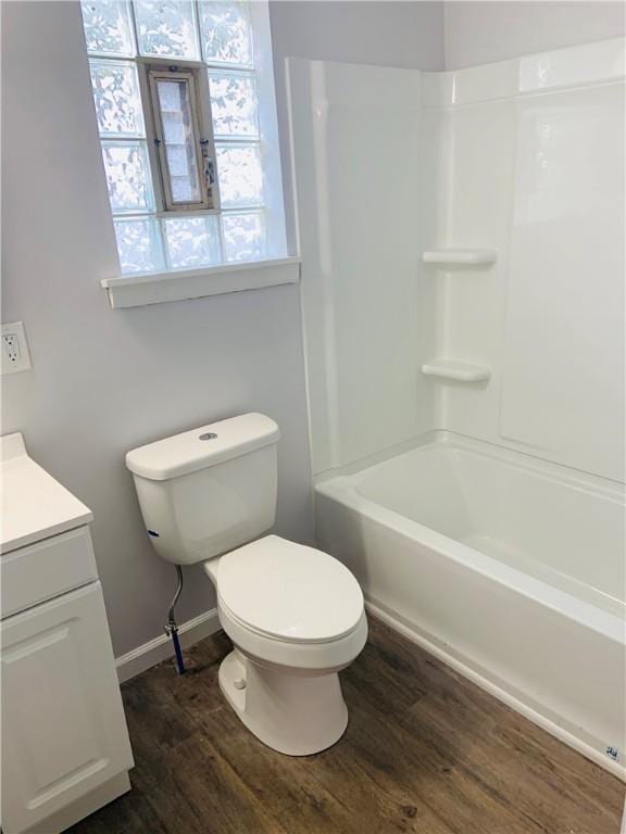 120 Graham Ave N, Versailles, PA 15137 - full bathroom featuring wood finished floors, vanity, and washtub / shower combination