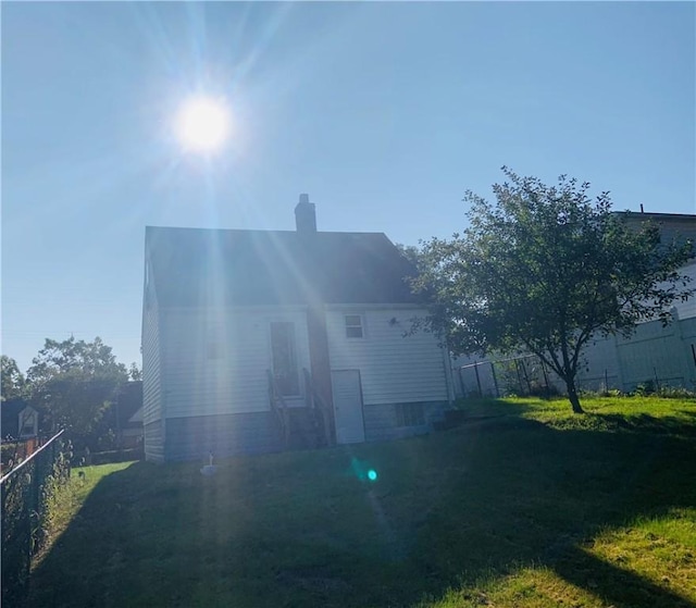 120 Graham Ave N, Versailles, PA 15137 - back of property featuring a chimney