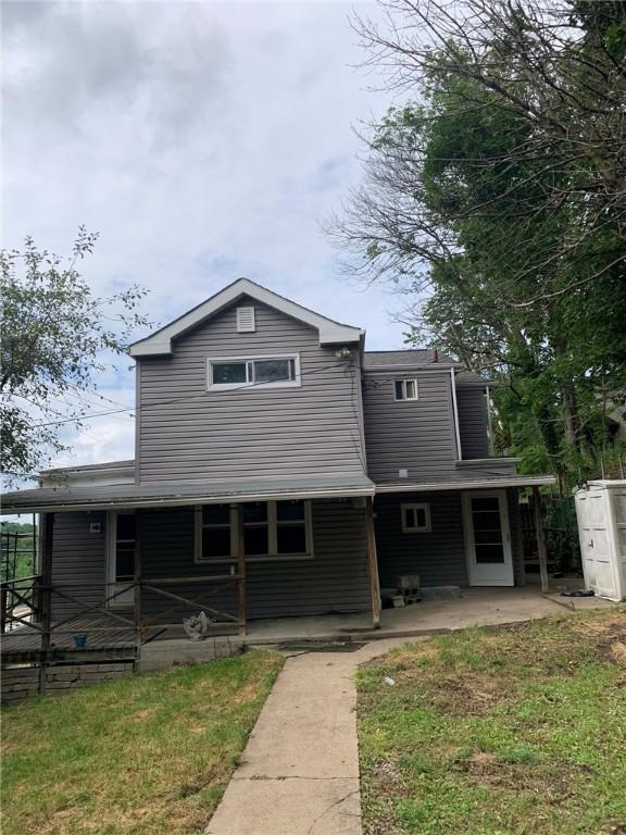 1309 Denise St, Overbrook, PA 15210 - view of front facade featuring a patio area