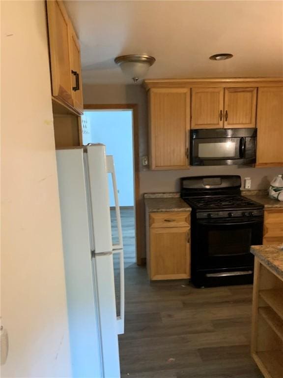 1309 Denise St, Overbrook, PA 15210 - kitchen with black appliances and dark wood-style floors