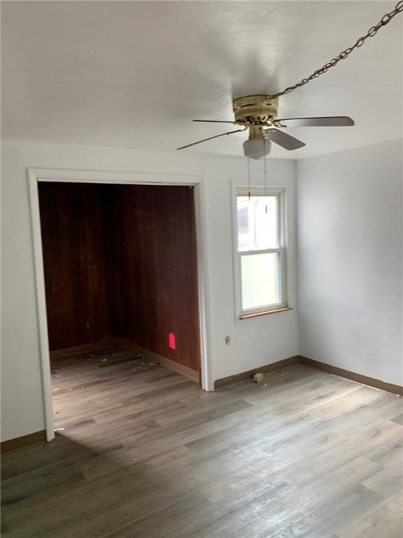 1309 Denise St, Overbrook, PA 15210 - spare room with a ceiling fan and wood finished floors