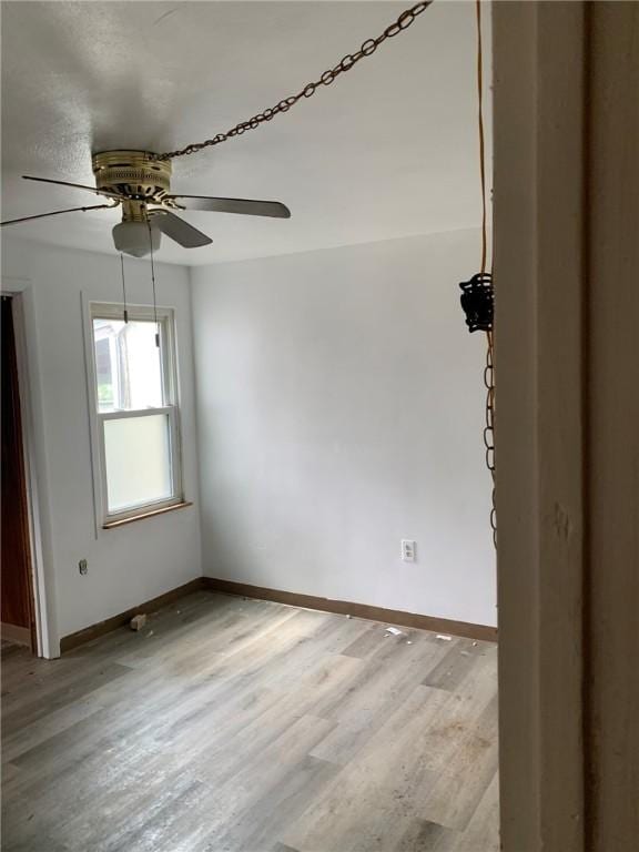 1309 Denise St, Overbrook, PA 15210 - empty room featuring ceiling fan and light wood-style flooring
