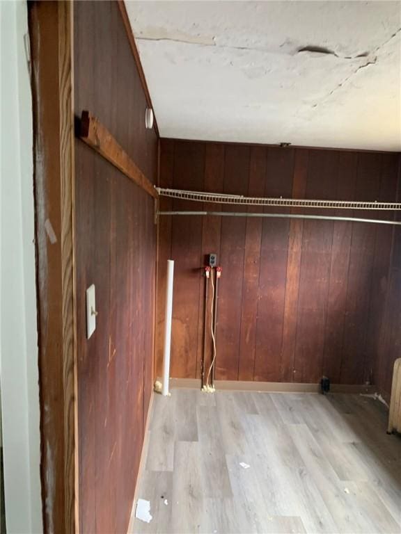 1309 Denise St, Overbrook, PA 15210 - laundry room with light wood-style floors and wood walls