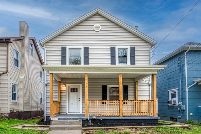 1122 Wade St, Aliquippa, PA 15001 - view of front facade with a porch and cooling unit