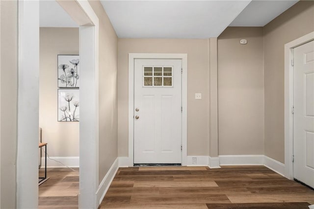 1122 Wade St, Aliquippa, PA 15001 - entryway featuring baseboards and wood finished floors