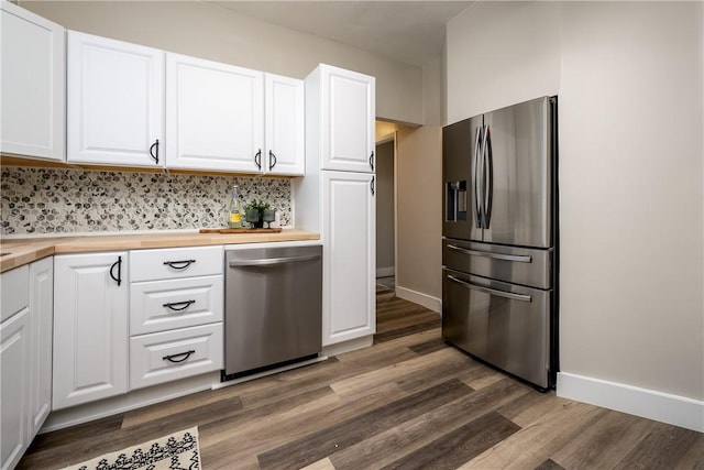 1122 Wade St, Aliquippa, PA 15001 - kitchen featuring stainless steel appliances, wood counters, light wood finished floors, and white cabinets