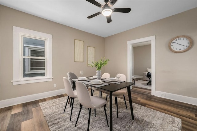 1122 Wade St, Aliquippa, PA 15001 - dining space with ceiling fan and dark wood-style floors