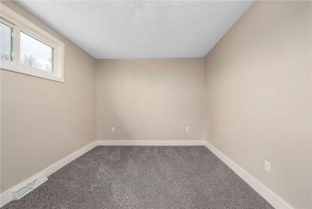 1122 Wade St, Aliquippa, PA 15001 - spare room featuring carpet flooring and baseboards