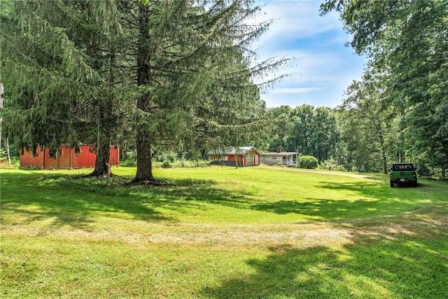 3067 N 3rd St, Jamestown, PA 16134 - view of grassy yard featuring a wooded view