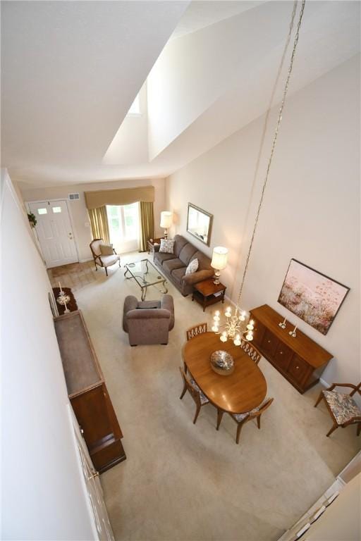 1065 Duncan Ln, Whitehall, PA 15236 - living room with carpet flooring and high vaulted ceiling