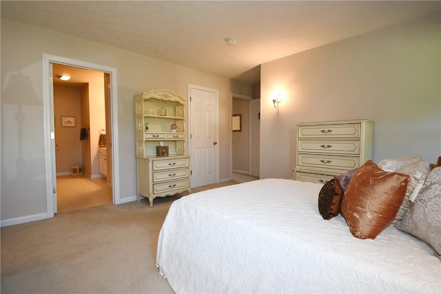 1065 Duncan Ln, Whitehall, PA 15236 - bedroom with light carpet and ensuite bath