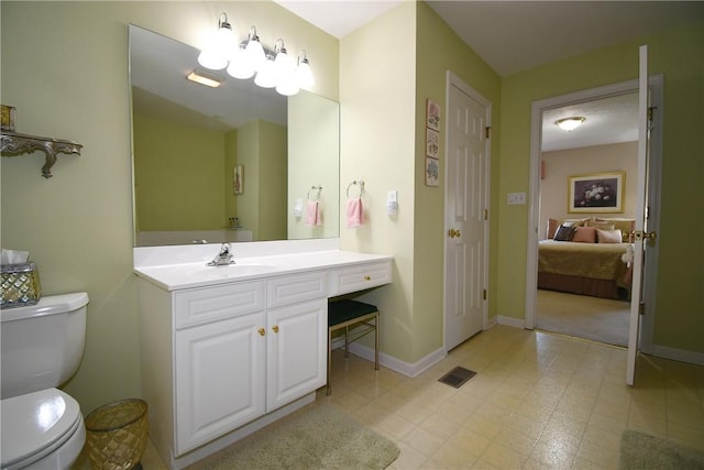 1065 Duncan Ln, Whitehall, PA 15236 - bathroom featuring vanity and ensuite bathroom