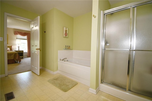 1065 Duncan Ln, Whitehall, PA 15236 - ensuite bathroom featuring a bath and a stall shower