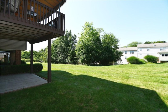 1065 Duncan Ln, Whitehall, PA 15236 - view of grassy yard featuring a patio area