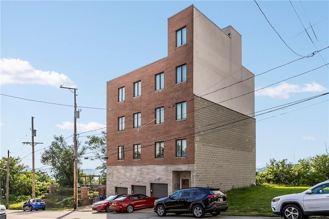 1825 Arcena St Unit 3, Downtown Pgh, PA 15219 - view of building exterior featuring a garage