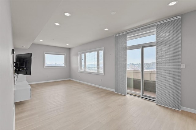 1825 Arcena St Unit 3, Downtown Pgh, PA 15219 - unfurnished living room featuring recessed lighting and light wood finished floors