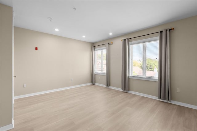 1825 Arcena St Unit 3, Downtown Pgh, PA 15219 - unfurnished room with light wood-style floors, recessed lighting, and a pendent fire sprinkler