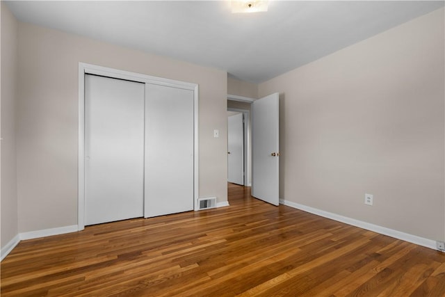108 Dave St, Daugherty Twp, PA 15066 - unfurnished bedroom featuring wood finished floors and a closet