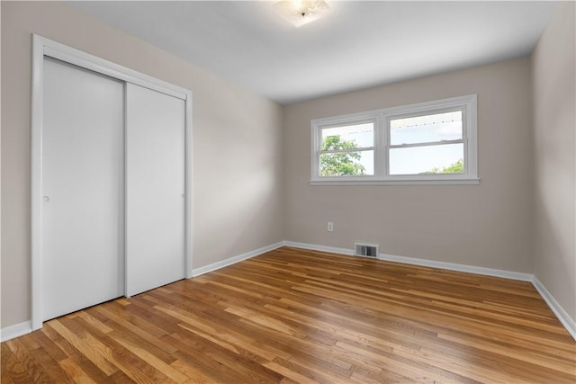 108 Dave St, Daugherty Twp, PA 15066 - unfurnished bedroom featuring light wood-type flooring and a closet