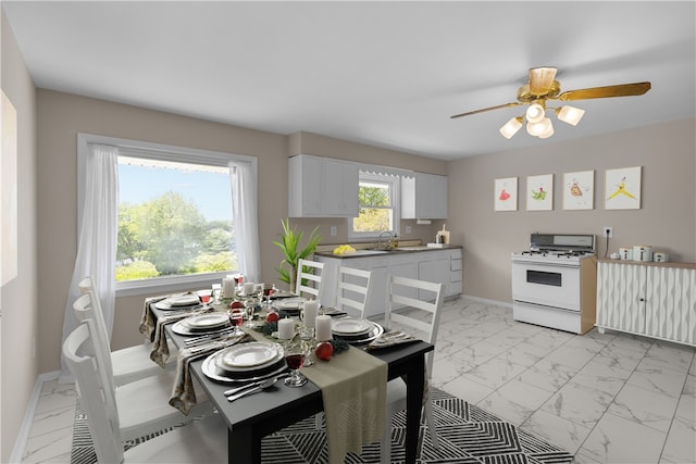 108 Dave St, Daugherty Twp, PA 15066 - kitchen featuring white gas range, light marble finish floors, white cabinets, and a ceiling fan