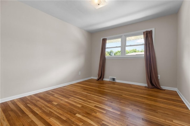 108 Dave St, Daugherty Twp, PA 15066 - unfurnished room with wood finished floors and baseboards