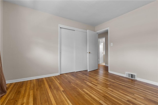 108 Dave St, Daugherty Twp, PA 15066 - unfurnished bedroom with a closet and wood finished floors