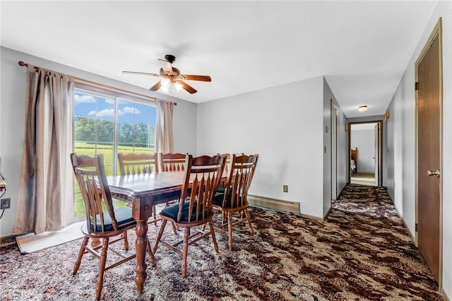 304 Wirsing Rd, Wharton Twp, PA 15440 - carpeted dining space with a baseboard heating unit and a ceiling fan