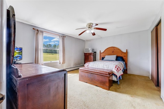 304 Wirsing Rd, Wharton Twp, PA 15440 - bedroom with carpet floors, baseboard heating, a ceiling fan, a closet, and a wall mounted AC