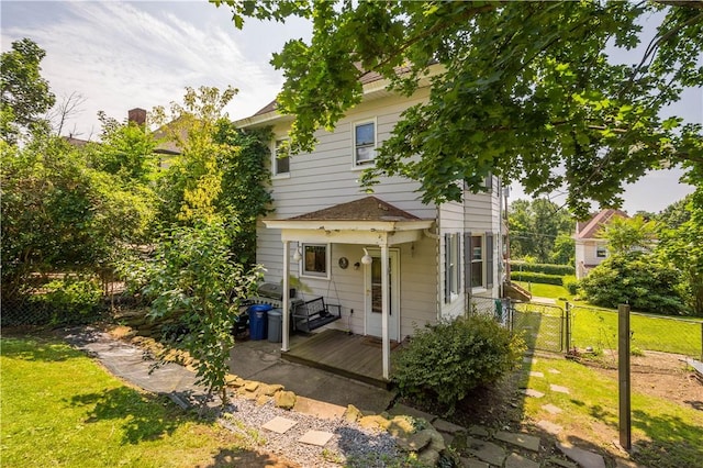 1246 Clairhaven St, Crafton Heights, PA 15205 - rear view of house featuring a wooden deck and a gate