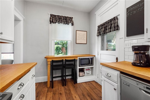 1246 Clairhaven St, Crafton Heights, PA 15205 - kitchen featuring dishwasher, built in microwave, wooden counters, white cabinets, and dark wood-style flooring