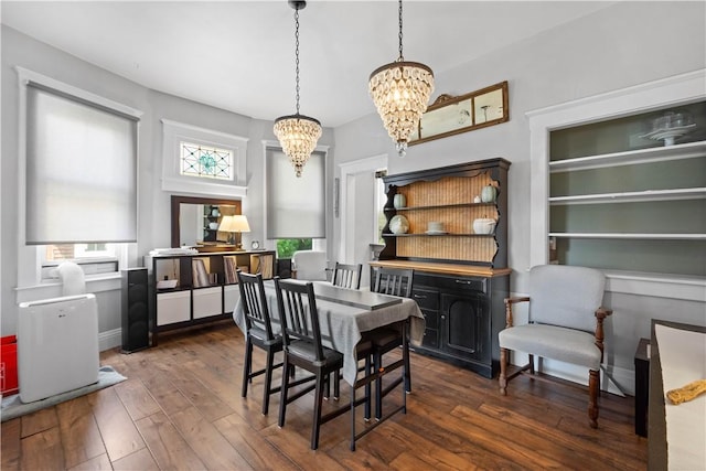 1246 Clairhaven St, Crafton Heights, PA 15205 - dining space featuring a chandelier, plenty of natural light, and dark wood-style flooring