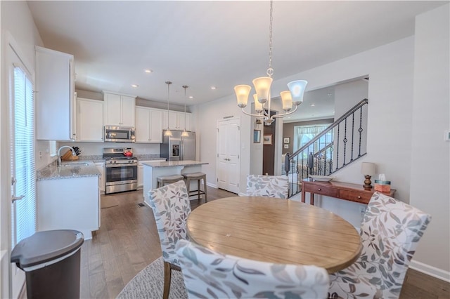 812 Theda Dori St, Cranberry Twp, PA 16066 - dining space featuring a chandelier, dark wood-style floors, stairs, and recessed lighting
