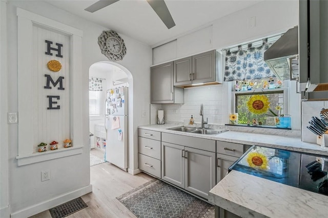 432 Kenmont Ave, Mt Lebanon, PA 15228 - kitchen featuring freestanding refrigerator, gray cabinets, and backsplash