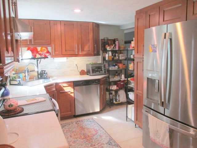 5025 Bocktown Rd, Hopewell Twp, PA 15001 - kitchen featuring stainless steel appliances, light countertops, light tile patterned floors, decorative backsplash, and recessed lighting