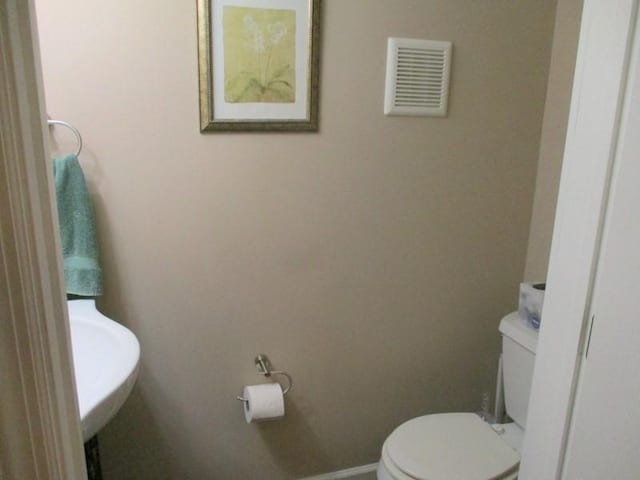 5025 Bocktown Rd, Hopewell Twp, PA 15001 - bathroom with toilet and baseboards