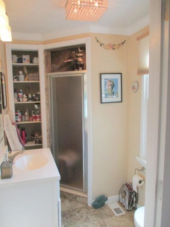 5025 Bocktown Rd, Hopewell Twp, PA 15001 - full bathroom featuring a shower stall, vanity, and crown molding