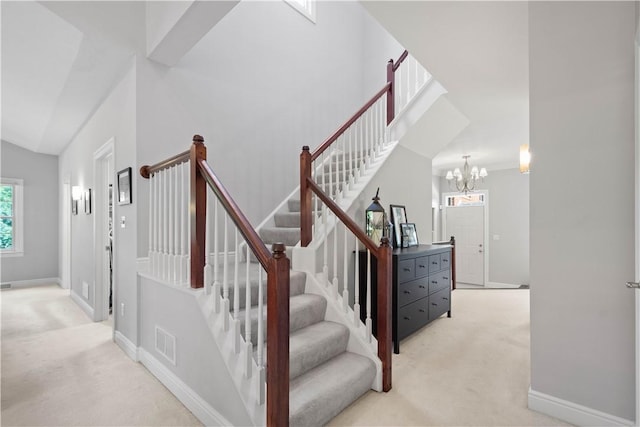 228 Highpointe Dr, Pittsburgh, PA 15220 - staircase with carpet and a chandelier