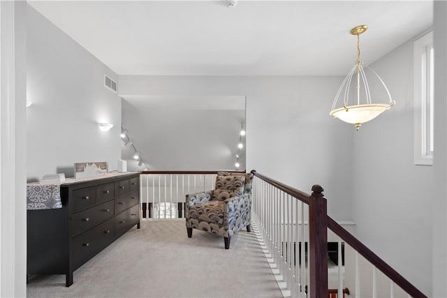 228 Highpointe Dr, Pittsburgh, PA 15220 - living area with an upstairs landing and light carpet