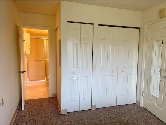 1987 Centurion Dr Unit 509, Forest Hills Boro, PA 15221 - unfurnished bedroom with dark colored carpet and multiple closets