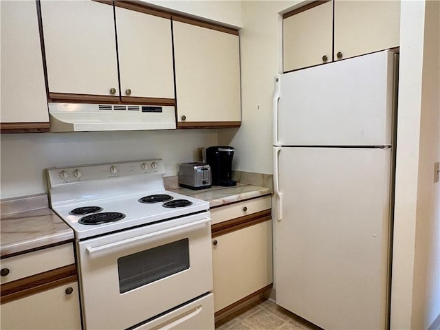 1987 Centurion Dr Unit 509, Forest Hills Boro, PA 15221 - kitchen with white appliances, under cabinet range hood, and light countertops