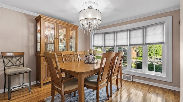341 E Mcmurray, Peters Twp, PA 15317 - dining room with a chandelier and wood finished floors